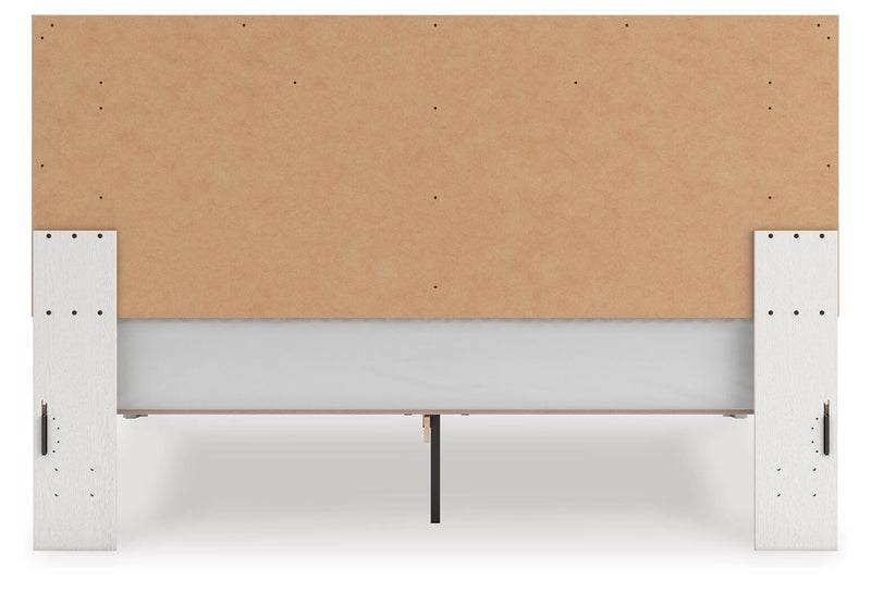 Zuraleus King Upholstered Panel Platform Bed